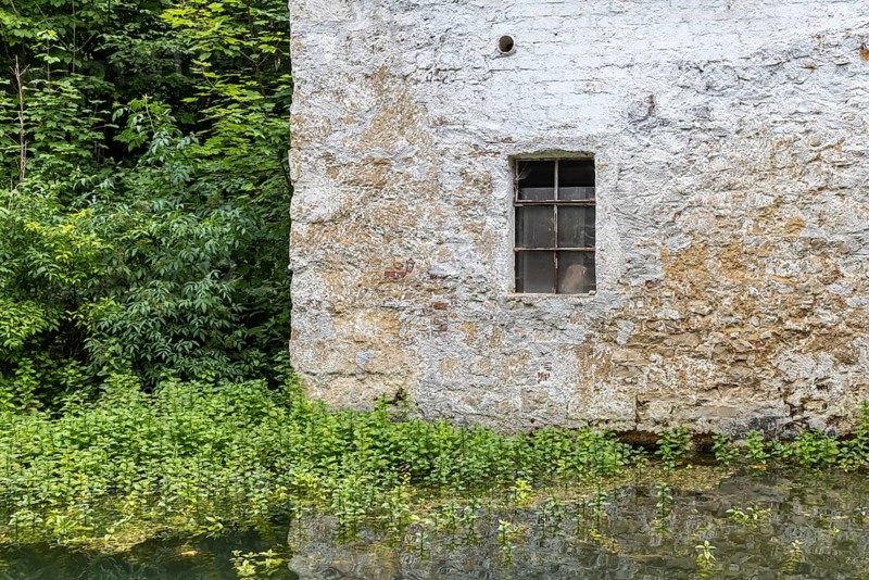 Old barn. The building is located near the source of the Zwiefalter Ach river at the Wimsen Cave excursion destination in the Swabian Alb. Hayingen, Baden-Württemberg, Germany