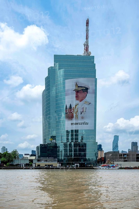Tower block National Telecom Public Company Limited with image of Thailand King Maha Vajiralongkorn, Bangkok, Thailand