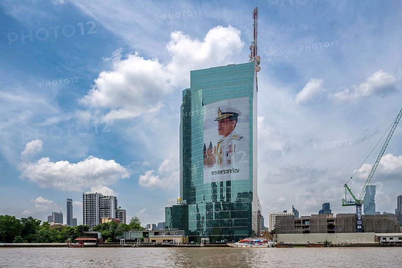 Tower block National Telecom Public Company Limited with image of Thailand King Maha Vajiralongkorn, Bangkok, Thailand