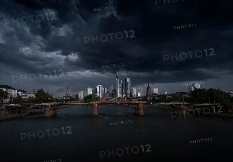 A storm passes over the Frankfurt banking skyline with gloomy clouds, Frankfurt am Main, Hesse, Germany