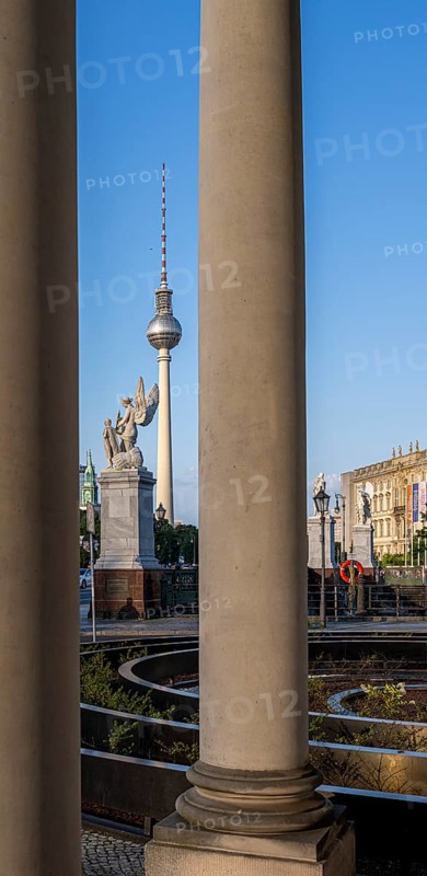 View through historic columns to the Schlossbrücke and the television tower, Berlin, Germany