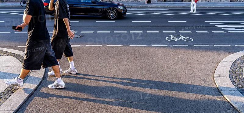 Road traffic and pedestrians on the carriageway in Berlin-Mitte, Unter den Linden, Berlin, Germany
