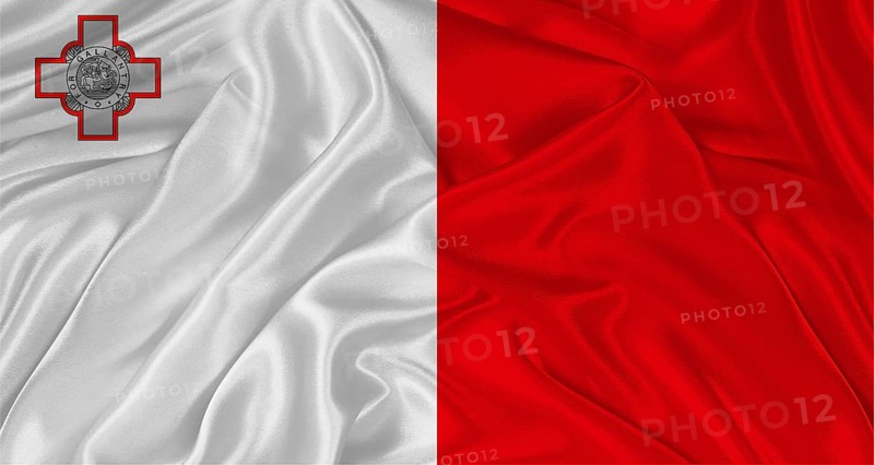 Flag of Malta with cloth texture. Close up of Maltese flag waving