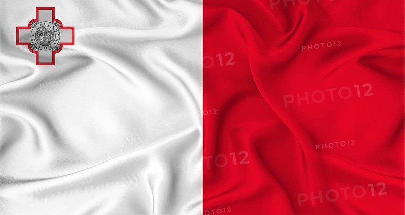 Realistic Malta flag waving. Close up of flag of Malta with cloth texture