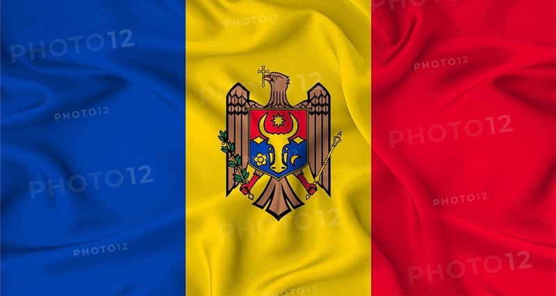 Realistic Moldova flag waving. Close up of flag of Moldova with cloth texture