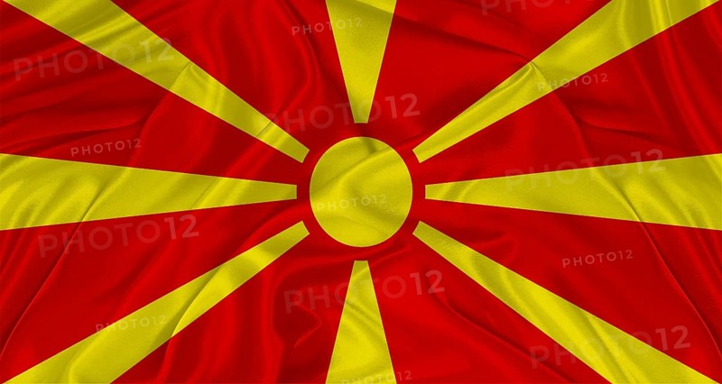 Flag of North Macedonia with cloth texture. Close up of Macedonian flag waving