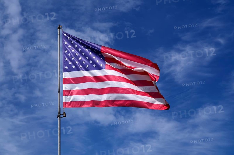 US flag, national flag USA, flies over National Guard memorial, memorial for US soldier Sgt. Frank D. Peregory, recipient of the Medal of Honour, Grandcamp-Maisy, D-Day, Operation Overlord, Normandy, Calvados, France