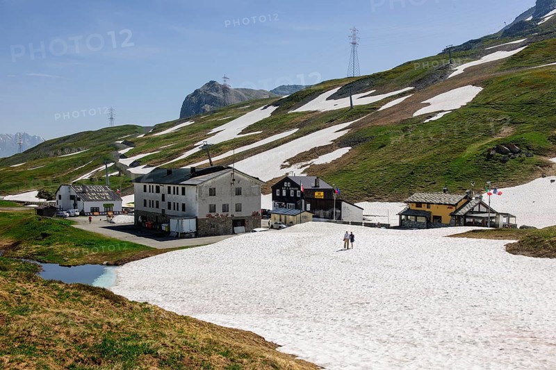 View of buildings Italian inns at the top of the Little Saint Bernard border pass between Italy and France, Colle del Piccolo San Bernardo, Col du Petit Saint Bernard Little Saint Bernard pass in the Alps, Autonomous Region of Valle d'Aosta, Italy