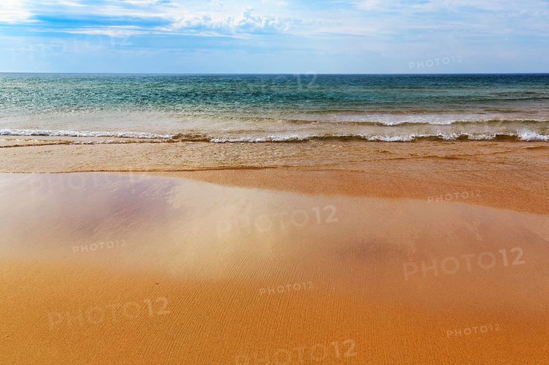 Orange-red lonely beach Raudisandur, sand, turquoise blue sea, Rauðisandur, coastline near Patreksfjördur, Vestfirðir, Westfjords, Iceland