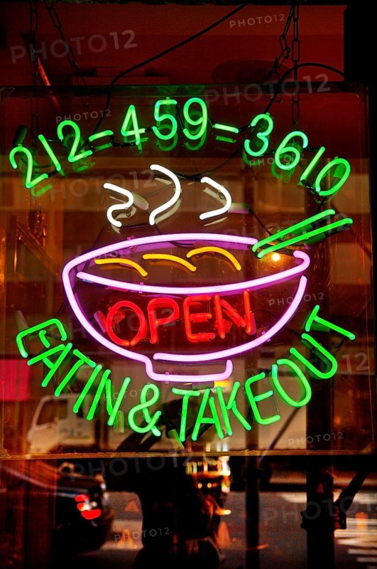 Illuminated advertising at a fast food restaurant, New York City, USA