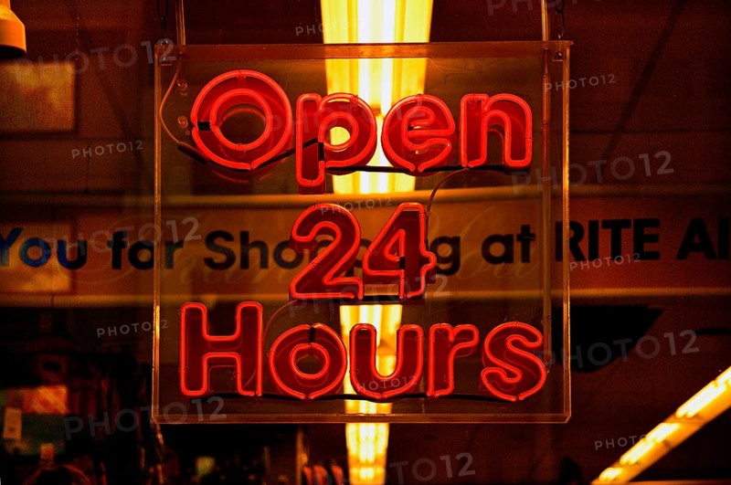 Illuminated sign Open 24 Hours in a shop, New York City, USA