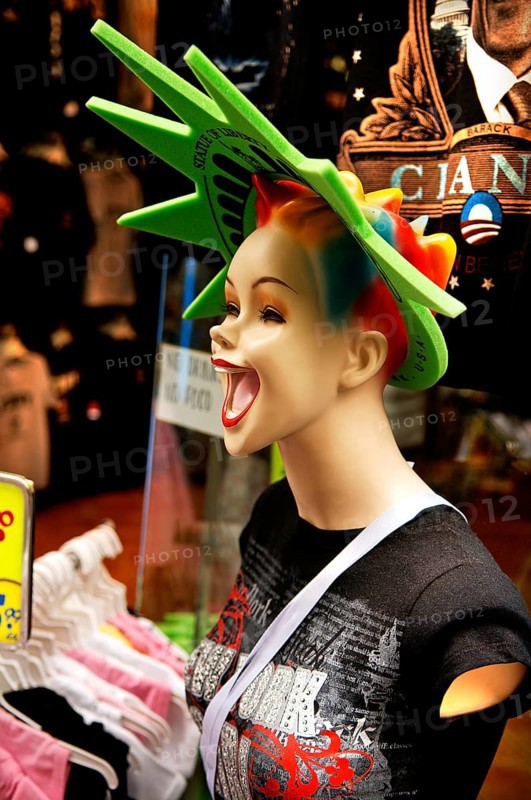 Laughing female mannequin with wreath of stars Statue of Liberty, New York City, USA