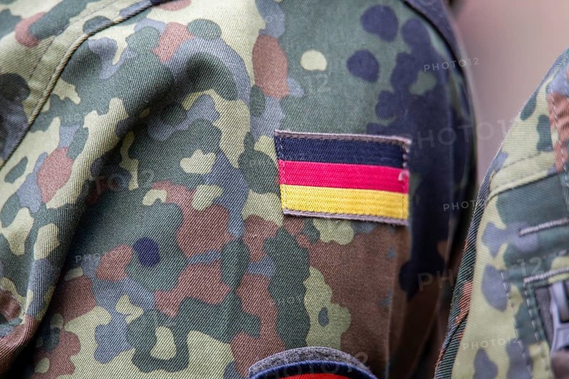 Bundeswehr symbolic image: close-up of the German flag on the Bundeswehr uniform