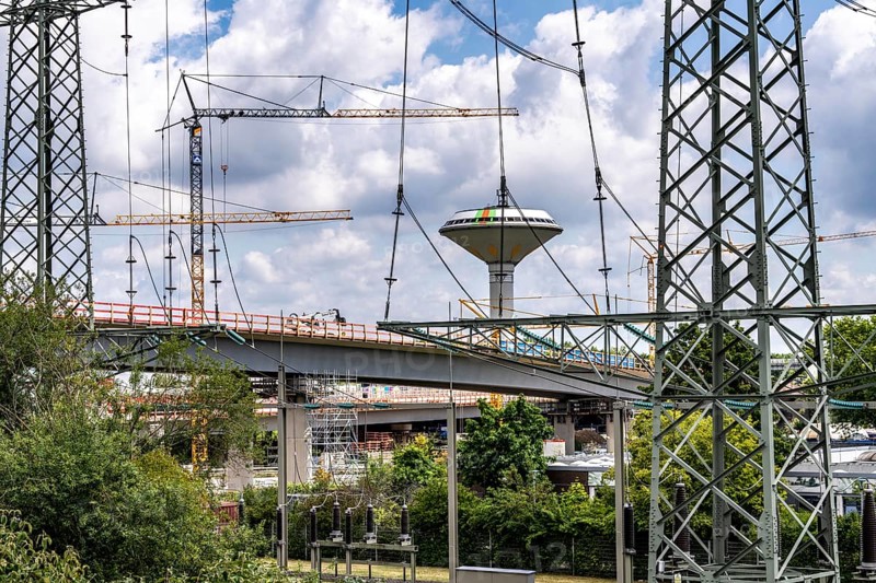 Motorway construction site at the Leverkusen-West junction, A1 and A59 motorways, new construction, reconstruction of the motorway junction due to the construction of the new Leverkusen Rhine Bridge, construction period until the end of 2027, Leverkusen water tower, North Rhine-Westphalia, Germany