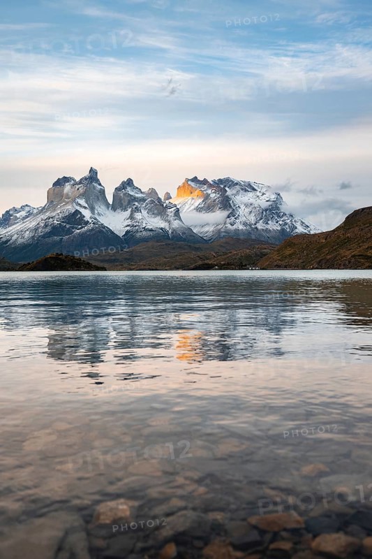 Cuernos del Paine mountain range at sunset, reflection in Lago Pehoe, Torres del Paine National Park, Chile