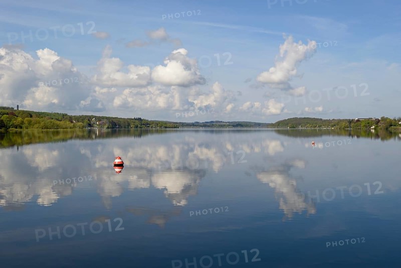 View over the Möhnesee, Möhnesee tower, red and white buoy, blue cloudy sky, reflection on the water surface, Möhnetalsperre, North Rhine-Westphalia, Germany