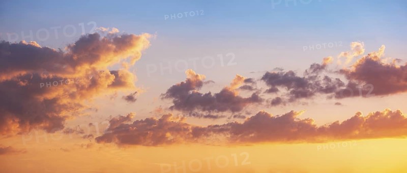 Wallpaper for sky replacement, evening sky with orange glowing clouds at sunset