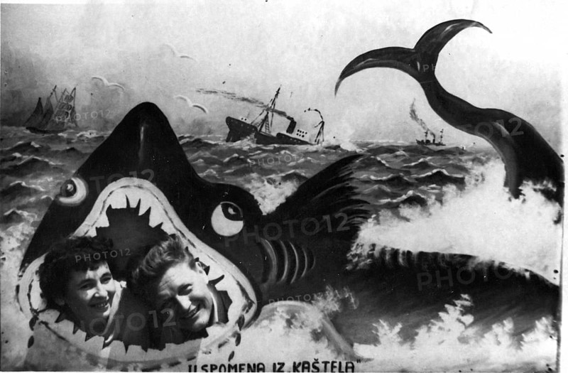 Shark backdrop. Photo shoot with couple in the mouth of a shark. ca. 1930, location unknown