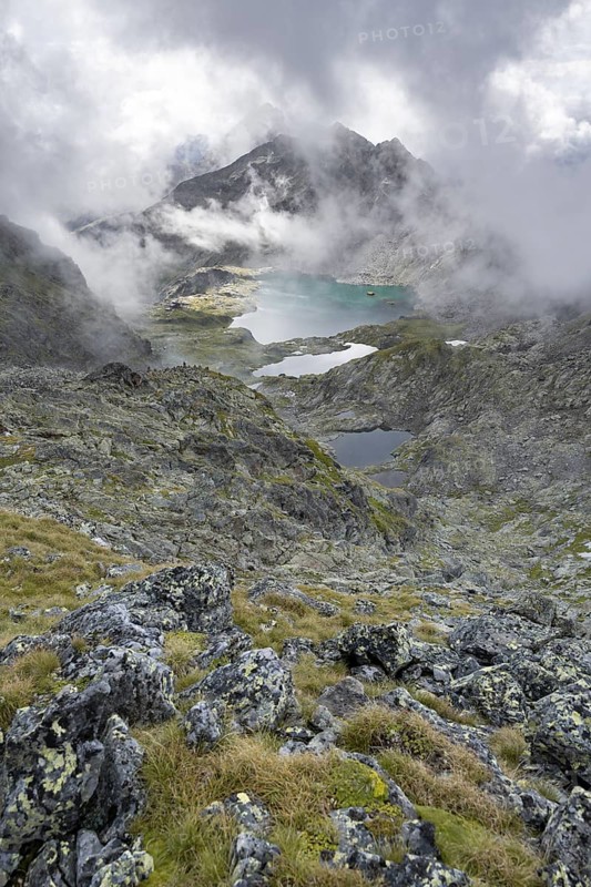 Mountain lakes Wangenitzsee and Kreuzsee, cloudy mountain peaks in the morning, Schober group, Hohe Tauern National Park, Carinthia, Austria