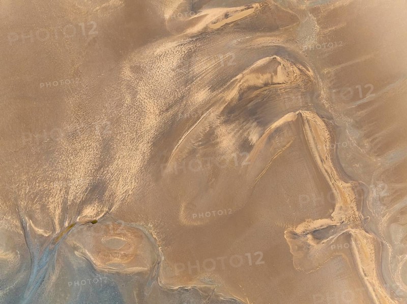 Low tide patterns in the ground of the Walvis Bay Lagoon. Aerial view. Drone shot. Namibia