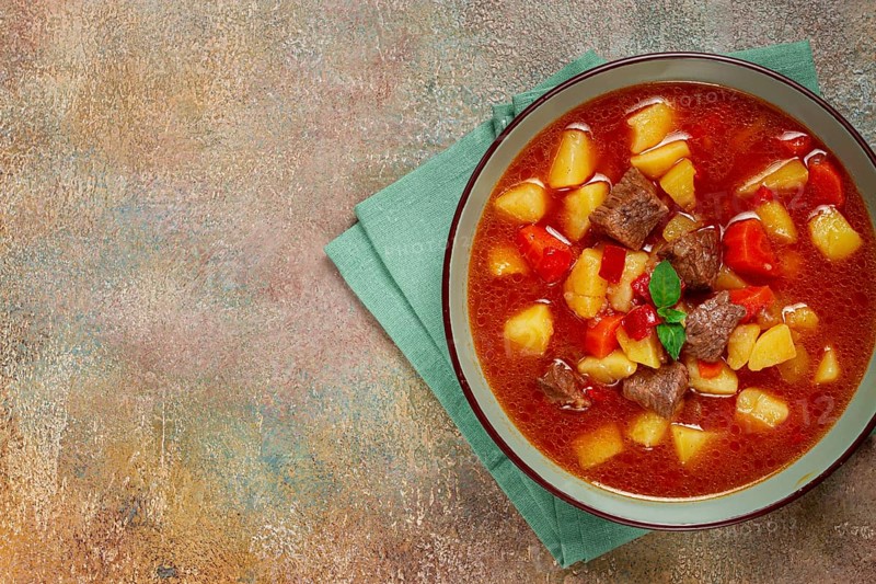 Meat goulash, with potatoes and carrots, sweet pepper, traditional Hungarian soup, homemade, no people