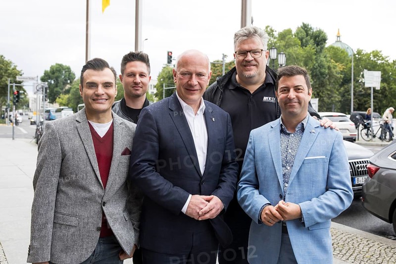 Kai Wegner (Governing Mayor of Berlin) with members of the LSVD (Lesbian and Gay Association in Germany) in front of the raising of the rainbow flag for Pride Week in front of the Rotes Rathaus in Berlin on 9 July 2025