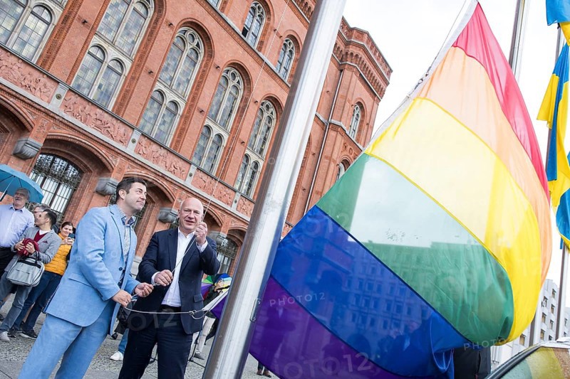 Florian Winkler-Schwarz, Managing Director of the Lesbian and Gay Federation (LSVD) Berlin Brandenburg and Kai Wegner (Governing Mayor of Berlin) at the raising of the rainbow flag for Pride Week in front of Berlin's Rotes Rathaus on 9 July 2025