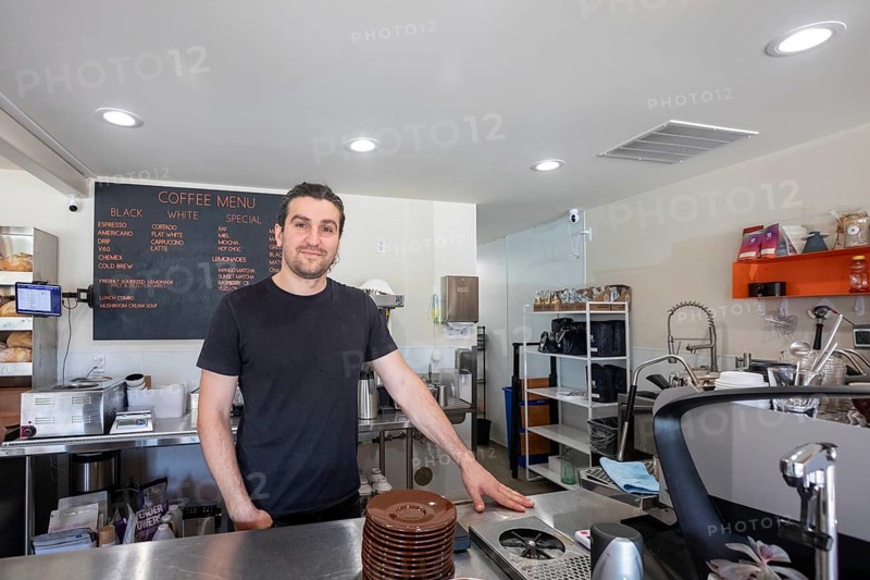 Midland, Michigan - Mohamed Miakiiev, one of the four Ukrainian refugees who own the popular Chef Sergey's Bakery. Several hundred thousand Ukrainians have been granted refugee status in the U.S. since Russia invaded their homeland, but the Trump Administration is considering whether to revoke their legal status. Miakiiev is from Crimea, which Russia has occupied since 2014