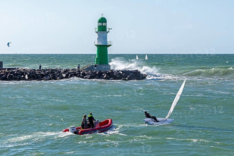 Waves, spray, people, boats, beacon, Warnow estuary, Warnemünde, Rostock, Mecklenburg-Western Pomerania, Germany
