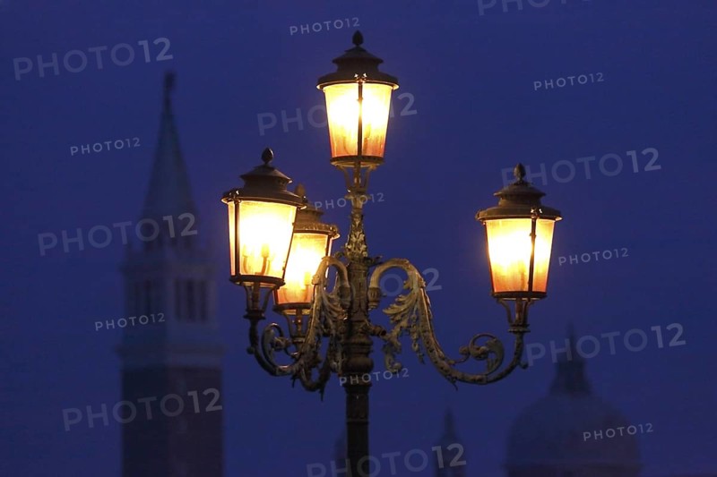 Candelabra on St Mark's Square with a view of San Gioggio Maggiore, Venice, Veneto, Italy