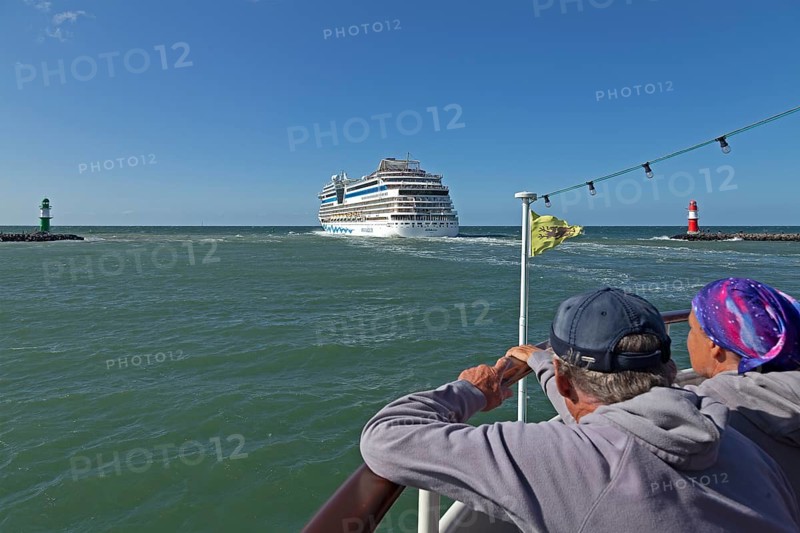 Cruise ship AIDA nova leaving, lighthouse, spectators, escort cruise, Warnow estuary, Warnemünde, Rostock, Mecklenburg-Western Pomerania, Germany