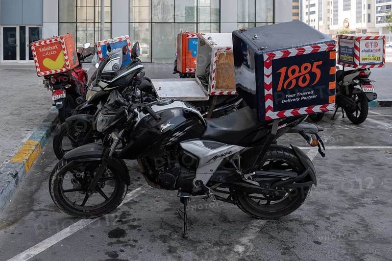 Symbol photo motorbike courier Essen, Abu Dhabi, United Arab Emirates