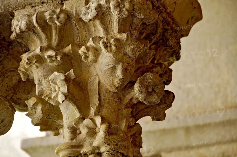 Slender Gothic column with filigree capital in the cloister, Gothic basilica of the Cistercian Abbey of Fossanova, Cistercian-Burgundian architectural style, Priverno, Province of Latina, Lazio, Italy