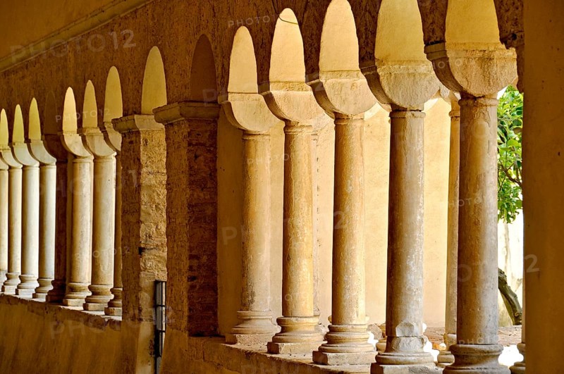 Romanesque columns, double columns in the cloister, Gothic basilica of the Cistercian Abbey of Fossanova, Cistercian-Burgundian architectural style, Priverno, Province of Latina, Lazio, Italy