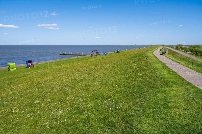 Beach chairs on the dyke, Pellworm Island, North Frisia, North Sea, Schleswig-Holstein, Germany