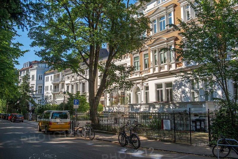 Street Contrescarpe along the southern banks of the ramparts, named after historical defence system, villa facade, exclusive living, front garden, metal fence, bicycles, cars parked, trees, sunshine, district Bremen-Mitte, Bremen, Germany