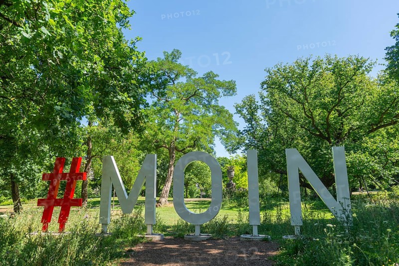 Hashtag Moin to greet you in the Bremen ramparts, formerly part of the city fortifications with ramparts and moat, today a park, history, nature experience, sunshine, Bremen, Germany