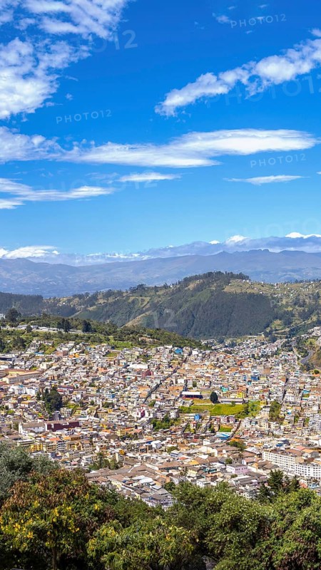 Skyline panoramic view of historic center in Quito, Ecuador from lookout of Virgin of Panecillo