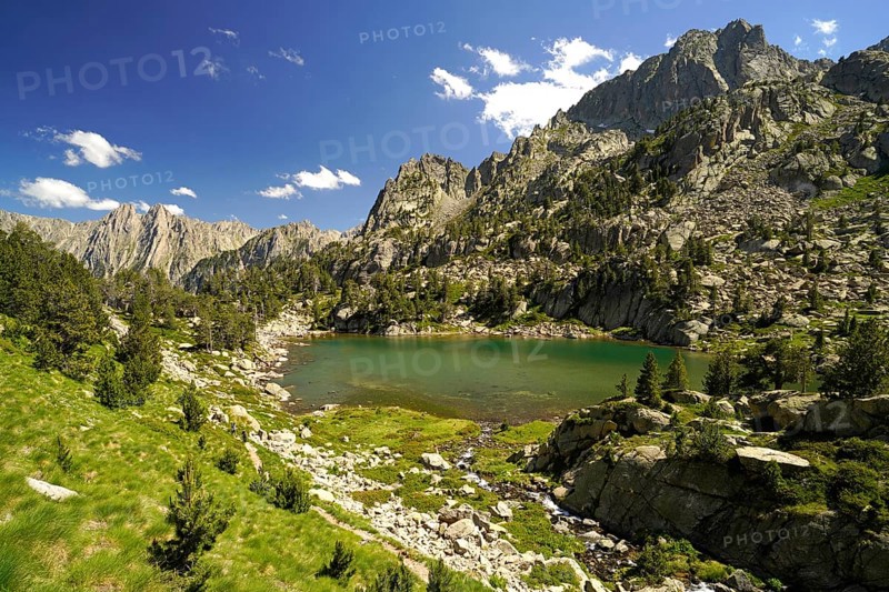 The glacial lake Estany de les Obagues de Ratera or Lagunas Llosas in the AigÃ¼estortes i Estany de Sant Maurici National Park, Catalonia, Spain