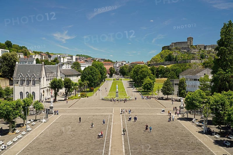 Rosary Square and fortress ChÃ¢teau fort de Lourdes in the Marian pilgrimage town of Lourdes, Pyrenees, France