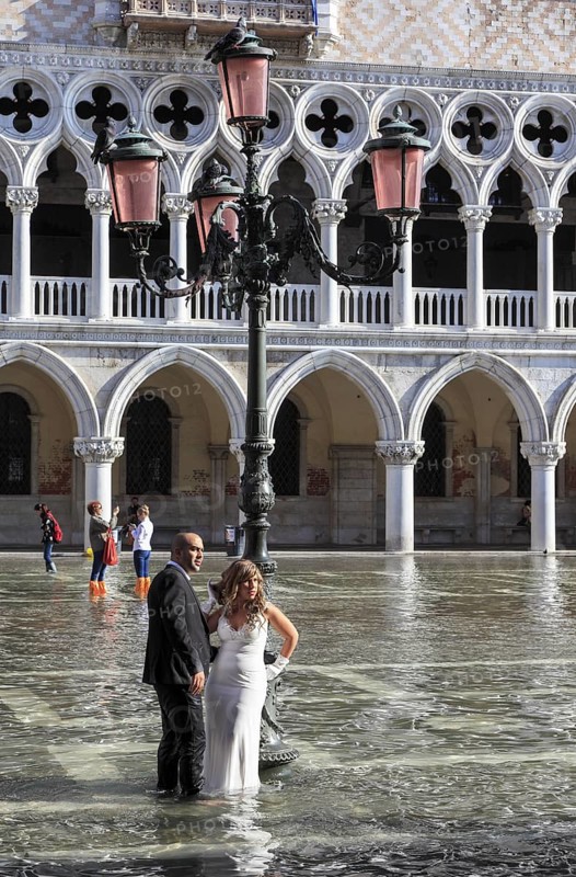Piazzetta, wedding photos at the Acqua Alta flood, Venice Veneto, Italy