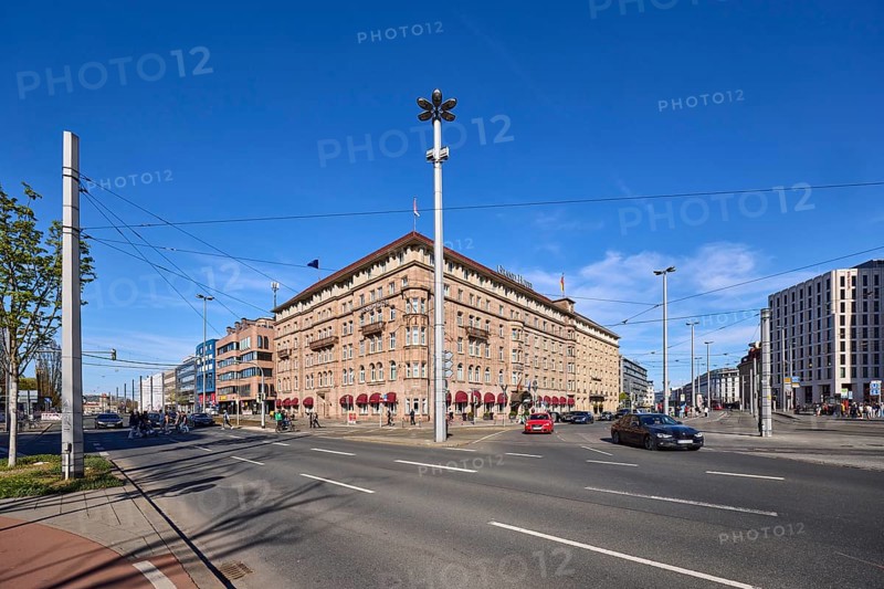 Le Méridien Grand Hotel Nuremberg, Marriott Hotels, traffic area, road markings, lanes, historic buildings, lantern, overhead lines, vehicles, cars, pedestrians as secondary motif, super wide angle, blue sky, cirrostratus clouds, intersection Königstorgraben with BahnhofstraÃŸe and Bahnhofsplatz, Nuremberg, Middle Franconia, independent city, Bavaria, Germany
