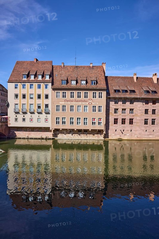 River Pegnitz, Spital-Apotheke, historical building, pharmacy, facade, window, abstract reflections, water surface, blue sky, cirrostratus clouds, Spitalgasse, Nuremberg, Middle Franconia, independent city, Bavaria, Germany