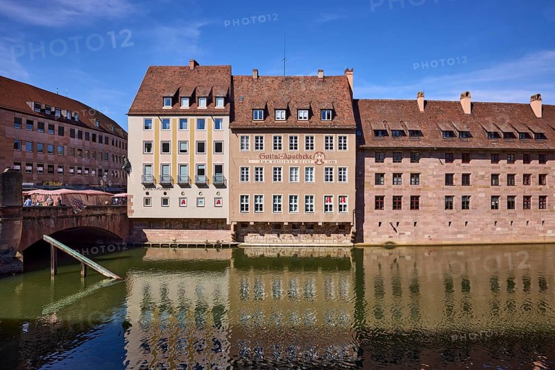River Pegnitz, Spital-Apotheke, historical building, pharmacy, facade, window, abstract reflections, water surface, blue sky, cirrostratus clouds, Spitalgasse, Nuremberg, Middle Franconia, independent city, Bavaria, Germany