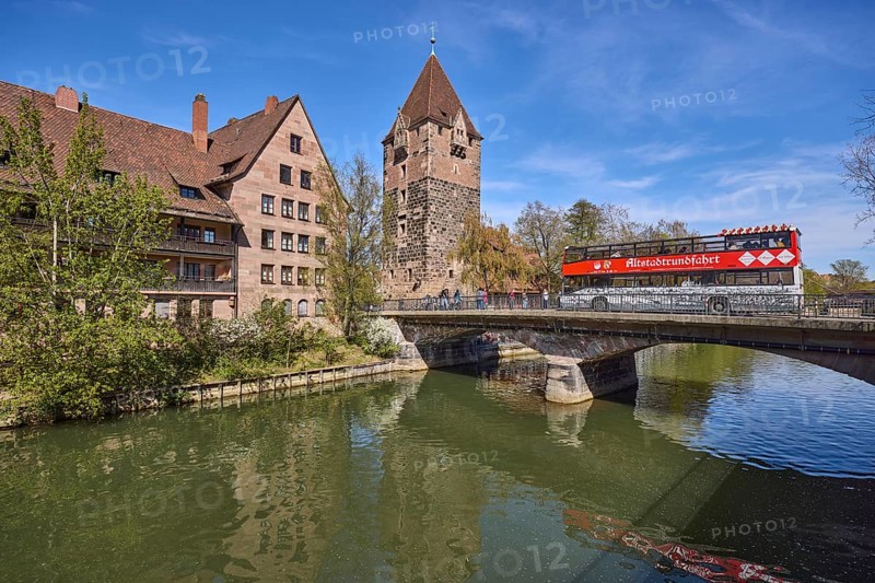 Tourism, city tours, bus, Schuldturm, river Pegnitz, bridge, historical buildings, house, trees, reflections, water surface, blue sky, cirrostratus clouds, HeubrÃ¼cke, Vordere Insel SchÃ¼tt, Nuremberg, Middle Franconia, independent city, Bavaria, Germany