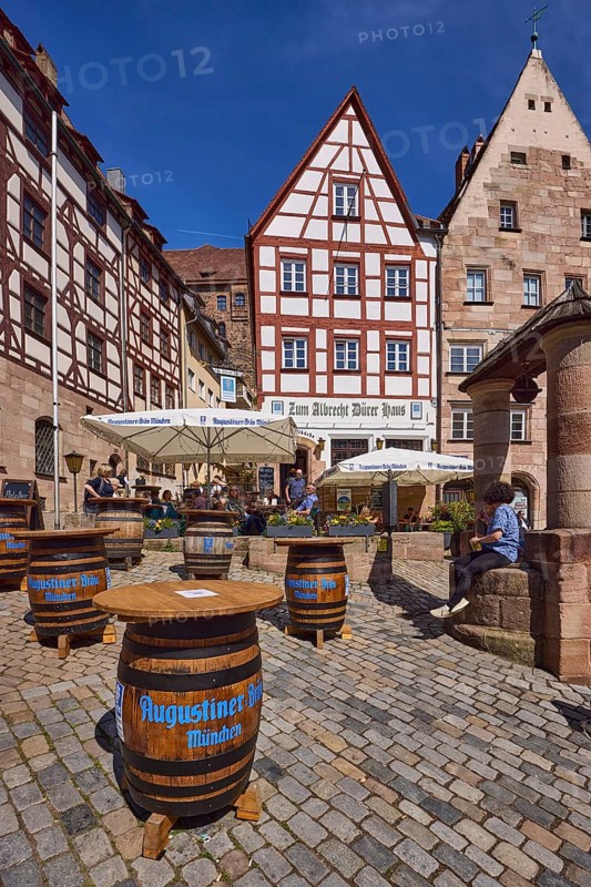 Zum Albrecht DÃ¼rer Haus, restaurant, outdoor area, gastronomy, wooden beer barrel, Augustiner-BrÃ¤u, historic buildings, half-timbered houses, fountain, stone, square, cobblestones, blue sky, cirrostratus clouds, Obere Schmiedgasse, Nuremberg, Middle Franconia, independent city, Bavaria, Germany