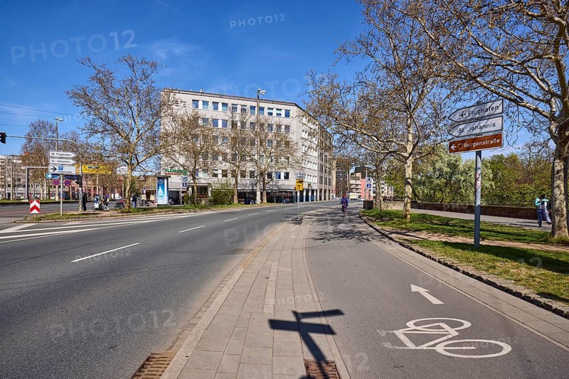 Footpath and cycle path, road marking cycle path, road, modern buildings, general architecture, trees, lawn, signposts, blue sky, cirrostratus clouds, Spittlertorgraben, Nuremberg, Middle Franconia, independent city, Bavaria, Germany