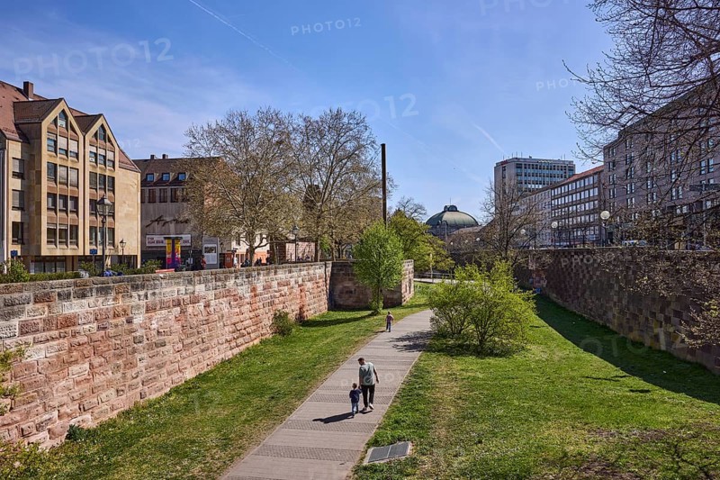 Old town, city fortification, city wall, general architecture, trees, lawn, footpath, pedestrian as secondary motif, blue sky, cirrostratus clouds, Frauentorgraben, Nuremberg, Middle Franconia, independent city, Bavaria, Germany