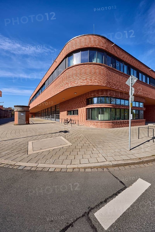 Fire Station 1, modern architecture, street, footpath, pavement slabs, asphalt, blue sky, cirrostratus clouds, intersection ReutersbrunnenstraÃŸe with MannertstraÃŸe, Nuremberg, Middle Franconia, independent city, Bavaria, Germany