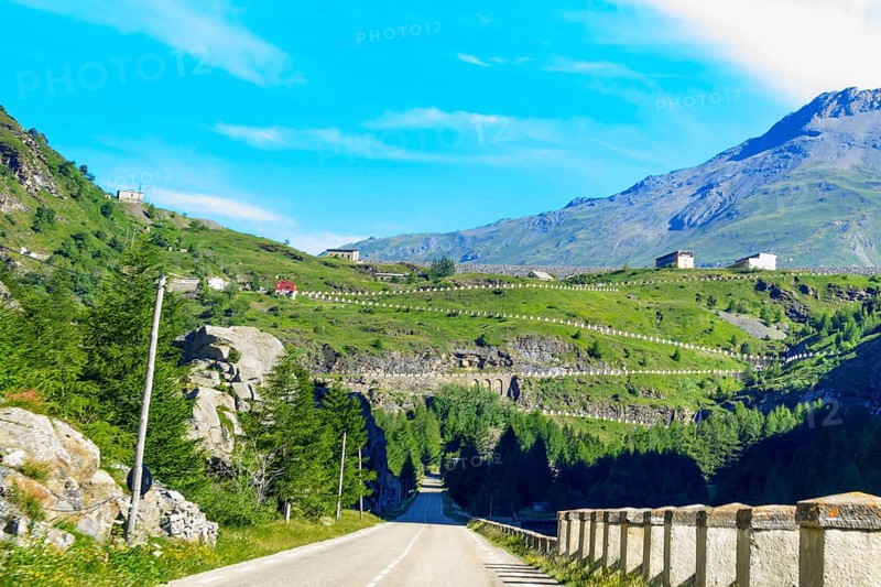 South ramp access road with hairpin bends on a steep slope to the Mont Cenis Pass Col du Mont Cenis in the French High Alps, Département Savoie, Region Auvergne-RhÃ´ne-Alpes, France